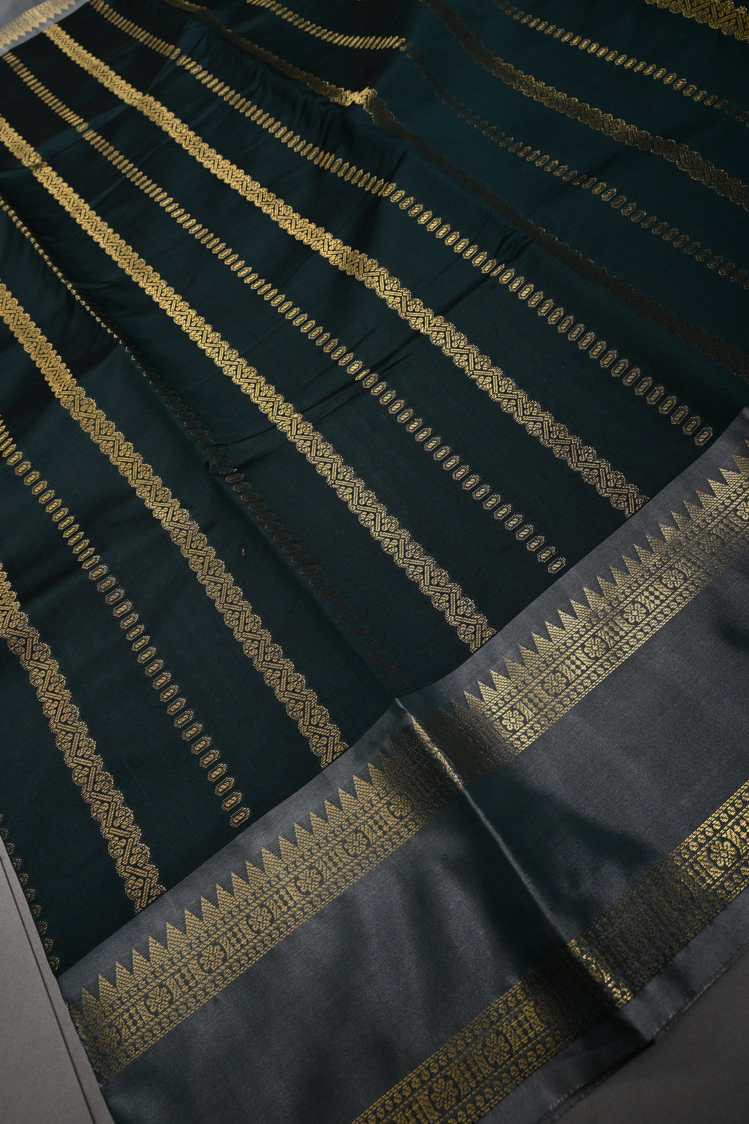 Hunter Green Kanjivaram Soft Silk Semi Saree with Ornate Zari Stripes and Rettaipet Zari Border | SHOBITAM