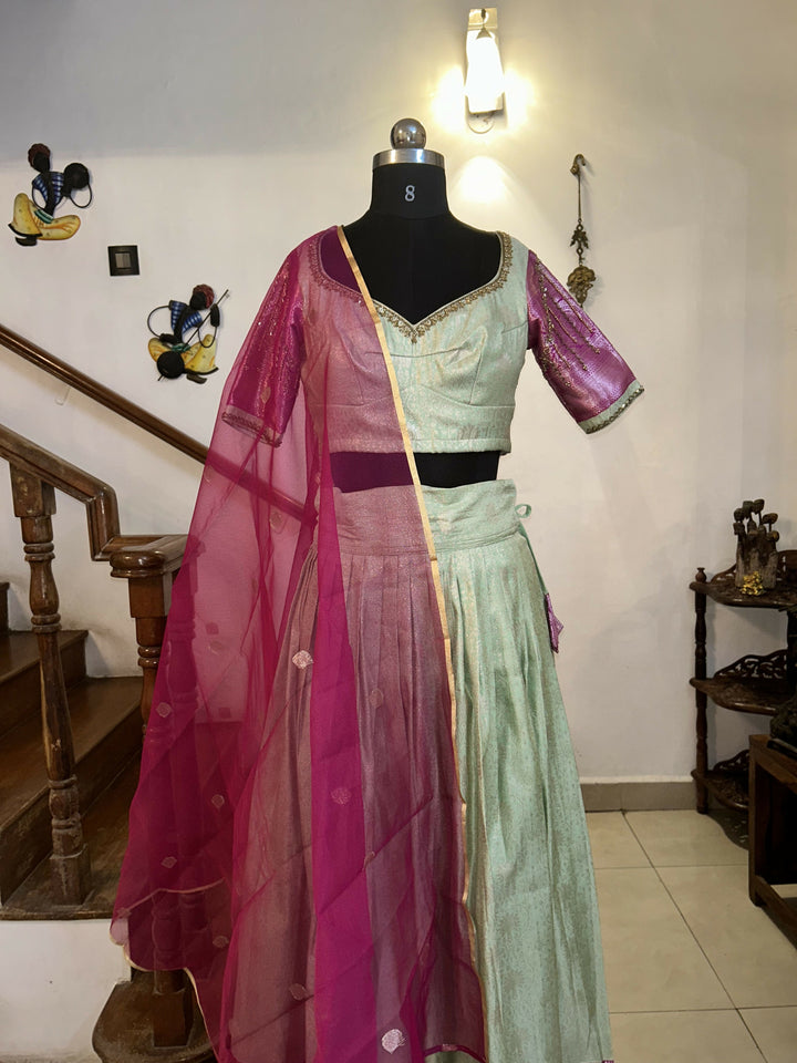 Yuvathi Mint green silk half Saree lehenga set with aari work