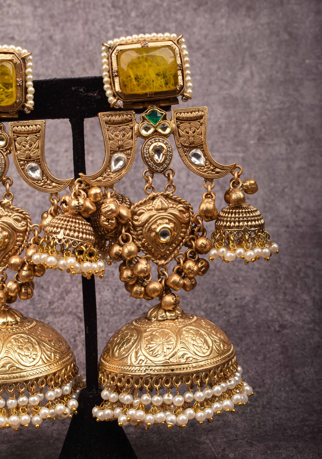 Tiger Claw design Gold tone Jhumka Earrings with Green White Yellow Stones