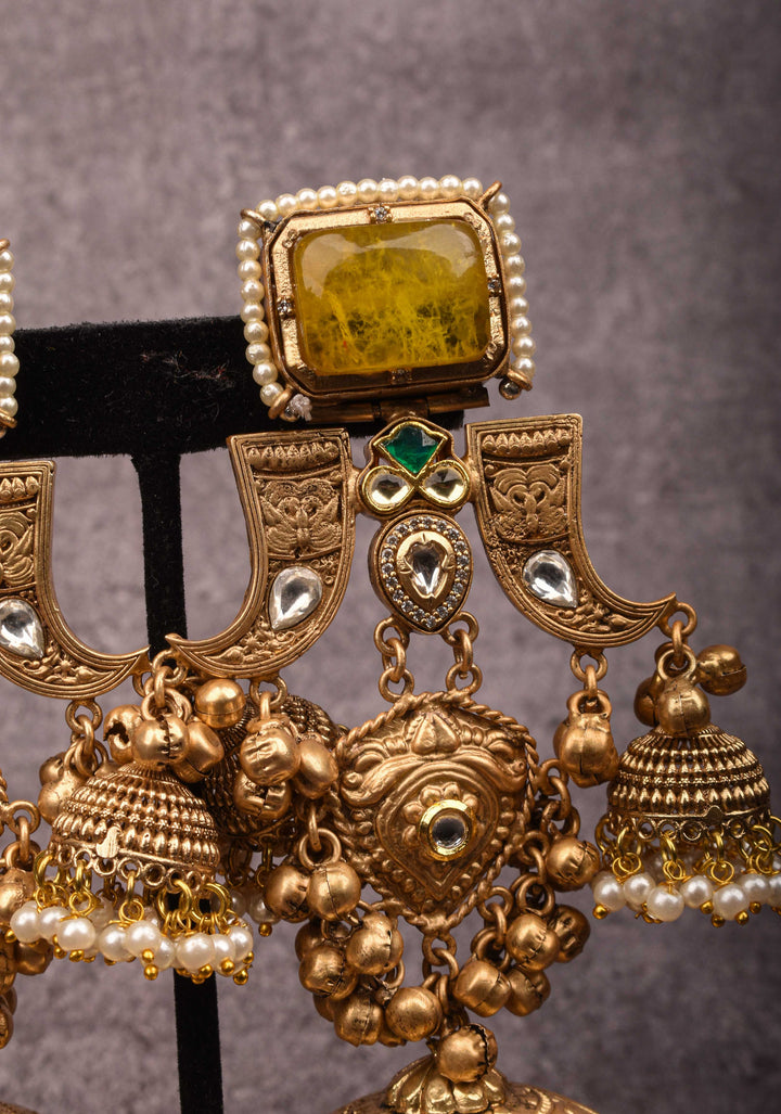 Tiger Claw design Gold tone Jhumka Earrings with Green White Yellow Stones