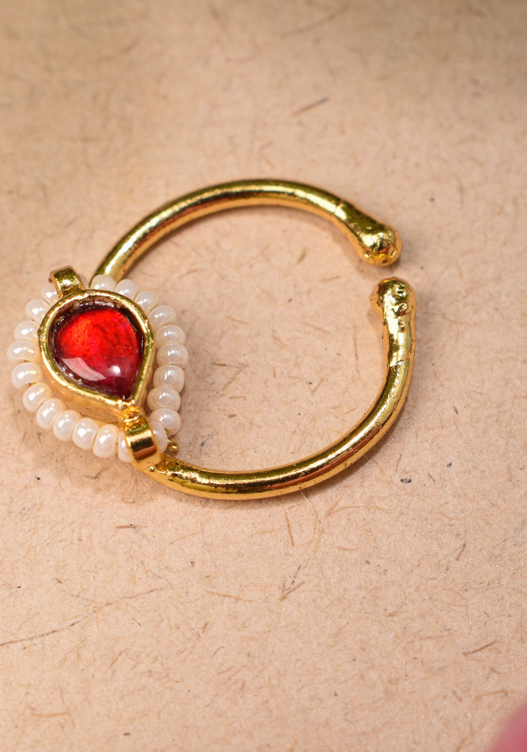 Red Kundan Clip on nose pin surrounded with Pearls Beads