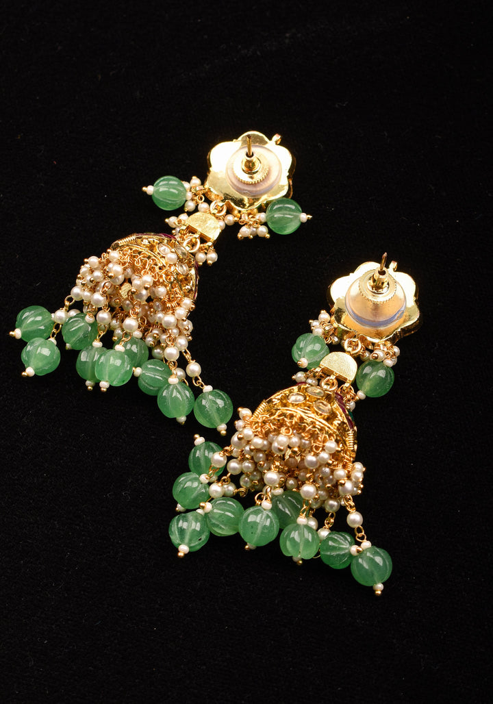 3" Tiered Jhumka earrings in antique gold embellished with Jadau stones