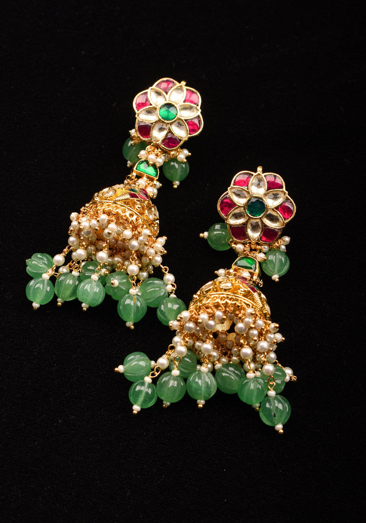 3" Tiered Jhumka earrings in antique gold embellished with Jadau stones