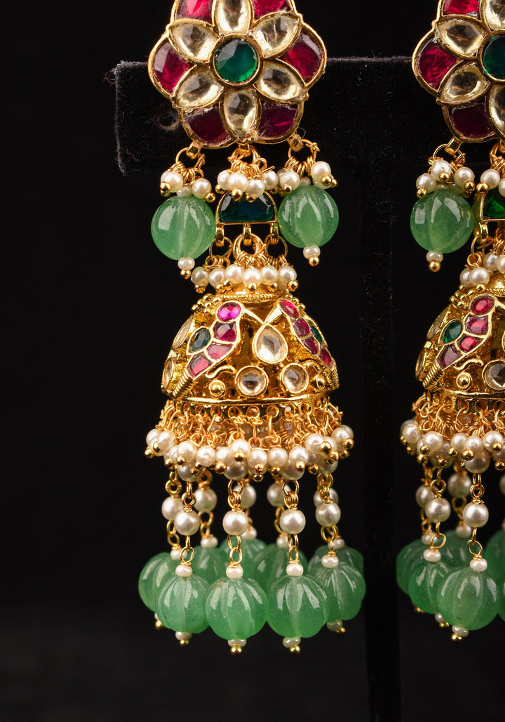 3" Tiered Jhumka earrings in antique gold embellished with Jadau stones