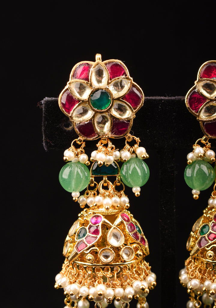 3" Tiered Jhumka earrings in antique gold embellished with Jadau stones