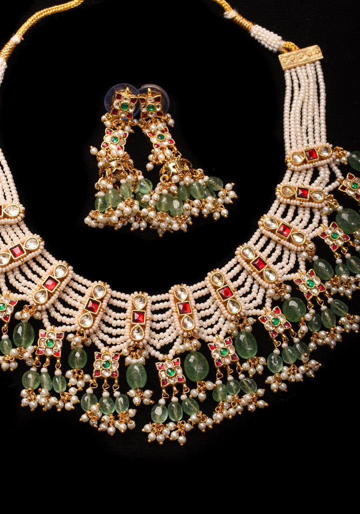 Multistrand beads Red and White stones Jadau Necklale Set with green dangling Beads | Shobitam Jewelry