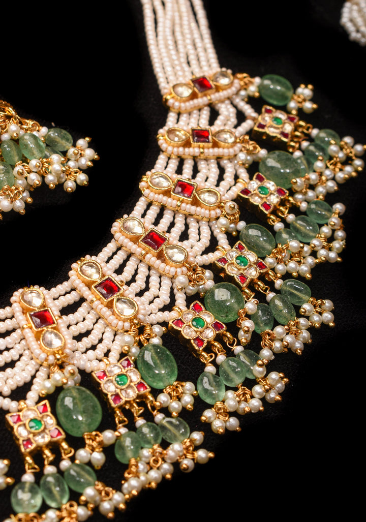 Multistrand beads Red and White stones Jadau Necklale Set with green dangling Beads | Shobitam Jewelry