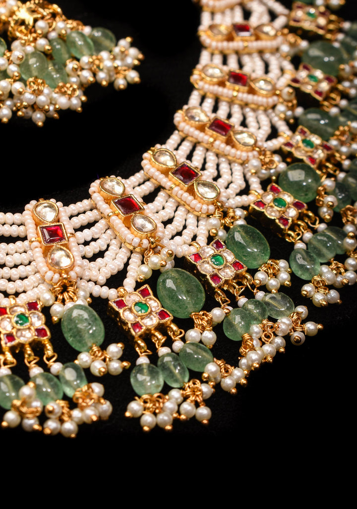 Multistrand beads Red and White stones Jadau Necklale Set with green dangling Beads | Shobitam Jewelry