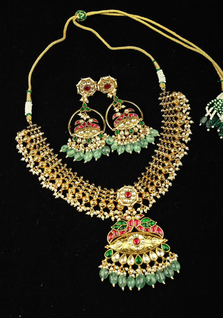 Microplated Gold Tone Flexible Design Necklace Set with Floral Jadau Center and Dangling Beads | SHOBITAM