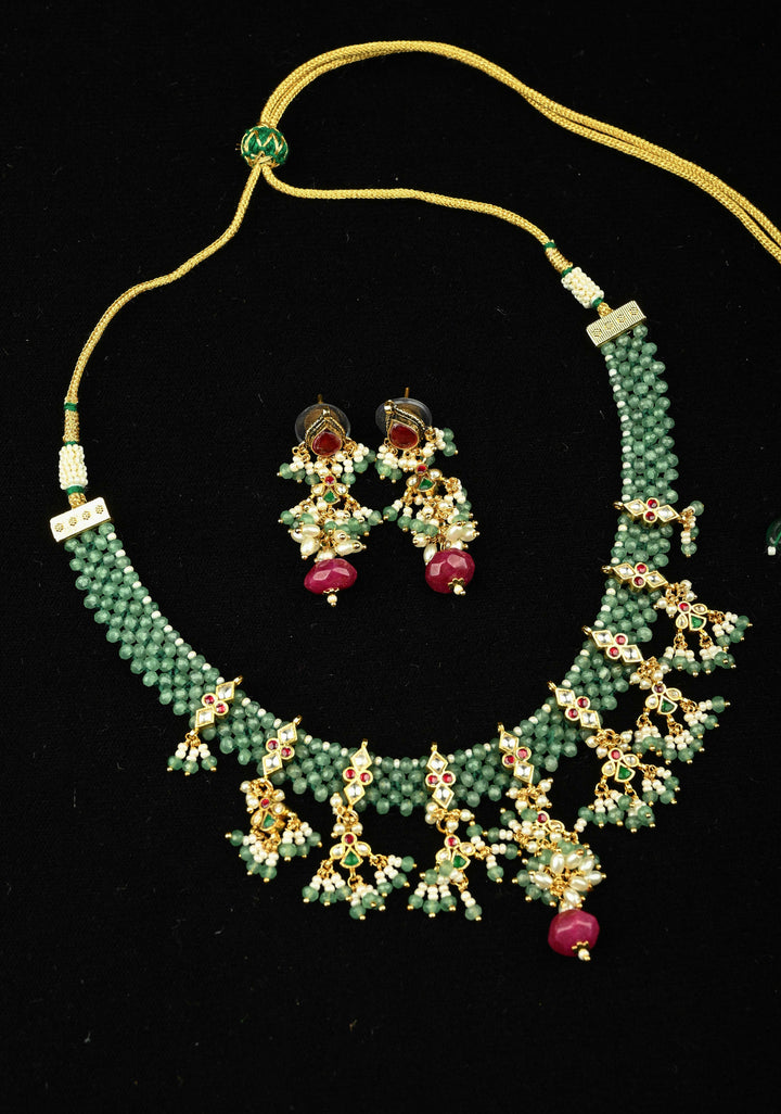 Multistrand Green Beaded Choker Necklace Set with Kundan Accents and Dangling Beads