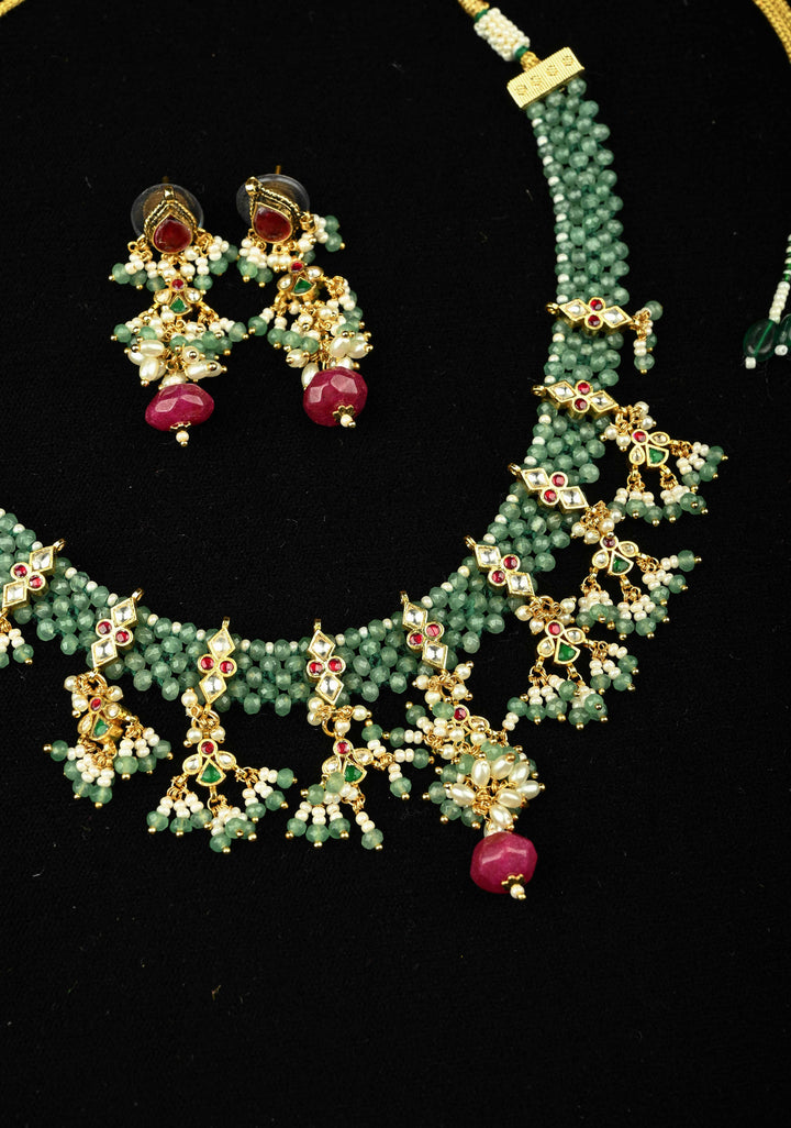 Multistrand Green Beaded Choker Necklace Set with Kundan Accents and Dangling Beads