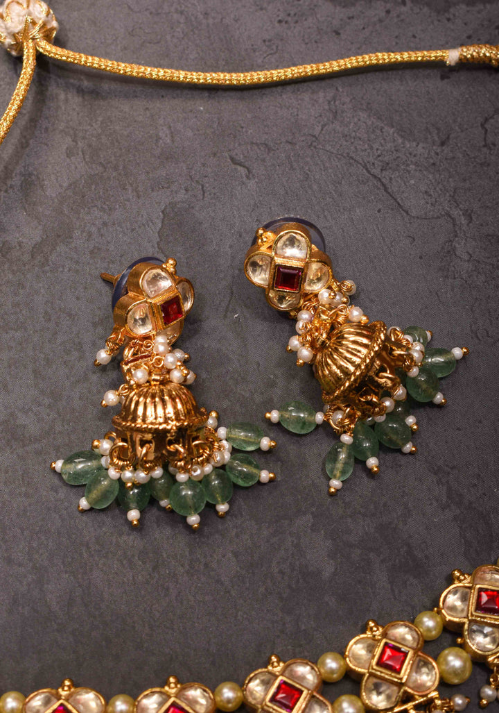 Jadau Choker Set with White and Red Stones and Green Dangling Beads | Shobitam Jewelry