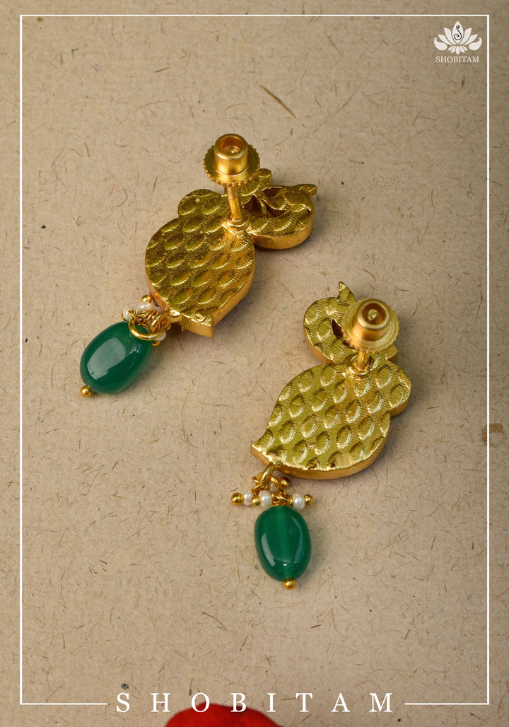 Handcrafted Jadau Peacock Earrings in Pink ,Green and  White color with dangling Green Bead | Shobitam Jewelry