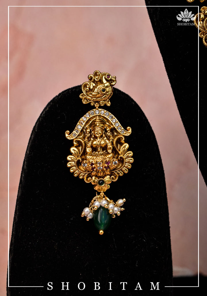 Traditional Lakshmi Pendant Necklace Set with dangling Green Beads | Shobitam Jewelry