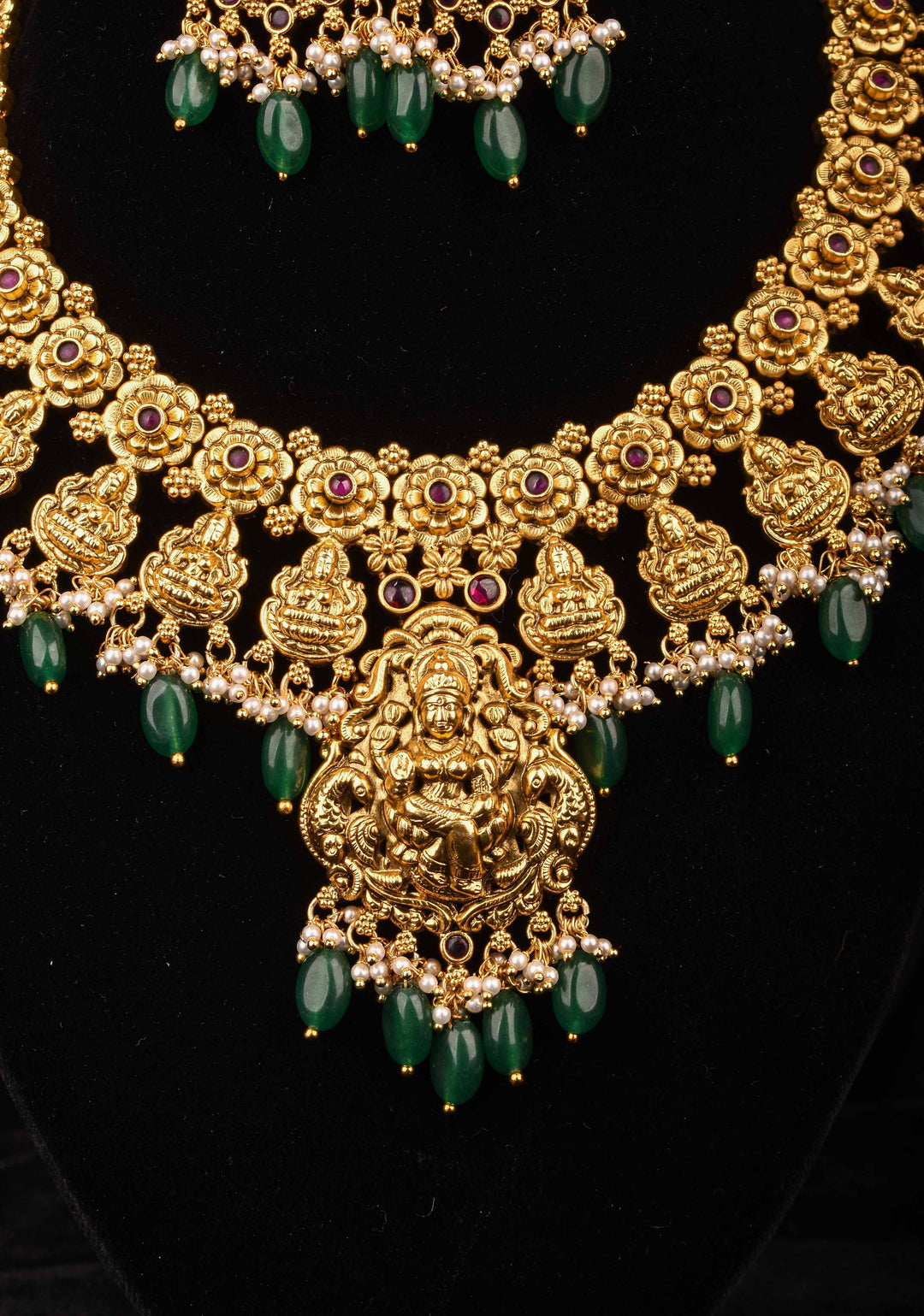 Jadau Lakshmi Necklace Set with Pink Stones dangling Green Beads | Shobitam Jewelry
