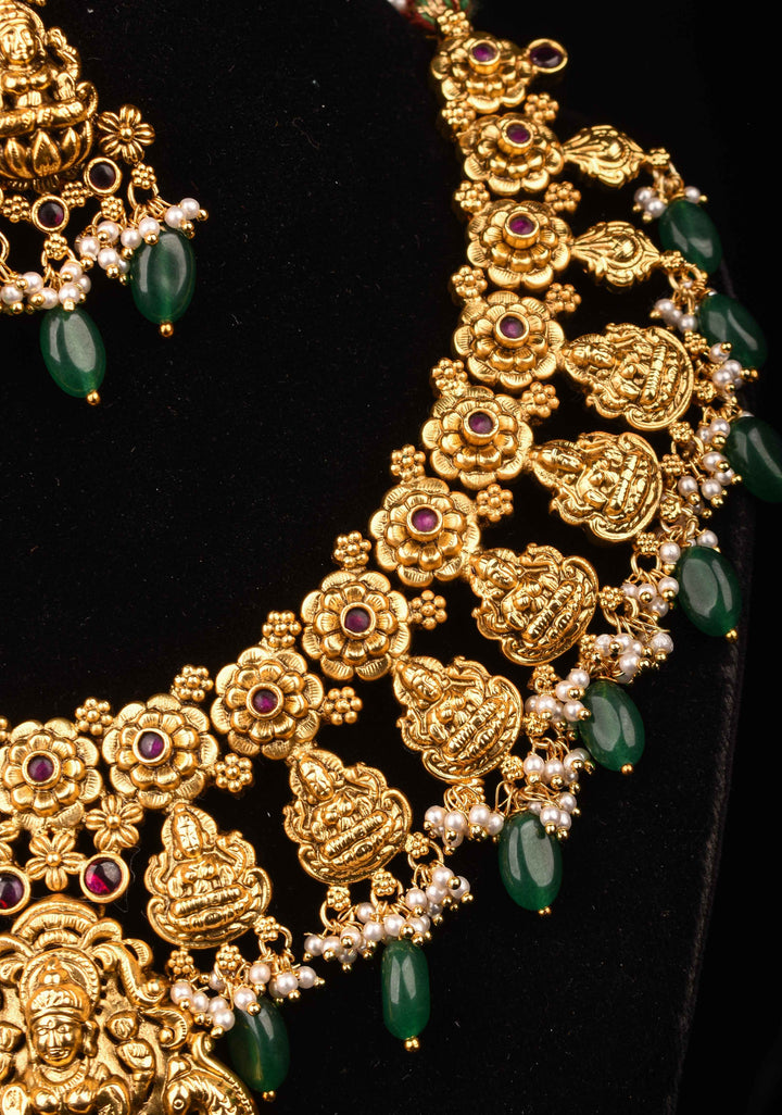 Jadau Lakshmi Necklace Set with Pink Stones dangling Green Beads | Shobitam Jewelry