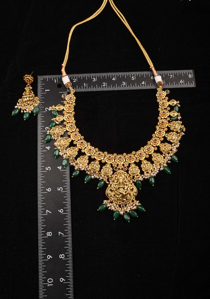 Jadau Lakshmi Necklace Set with Pink Stones dangling Green Beads | Shobitam Jewelry