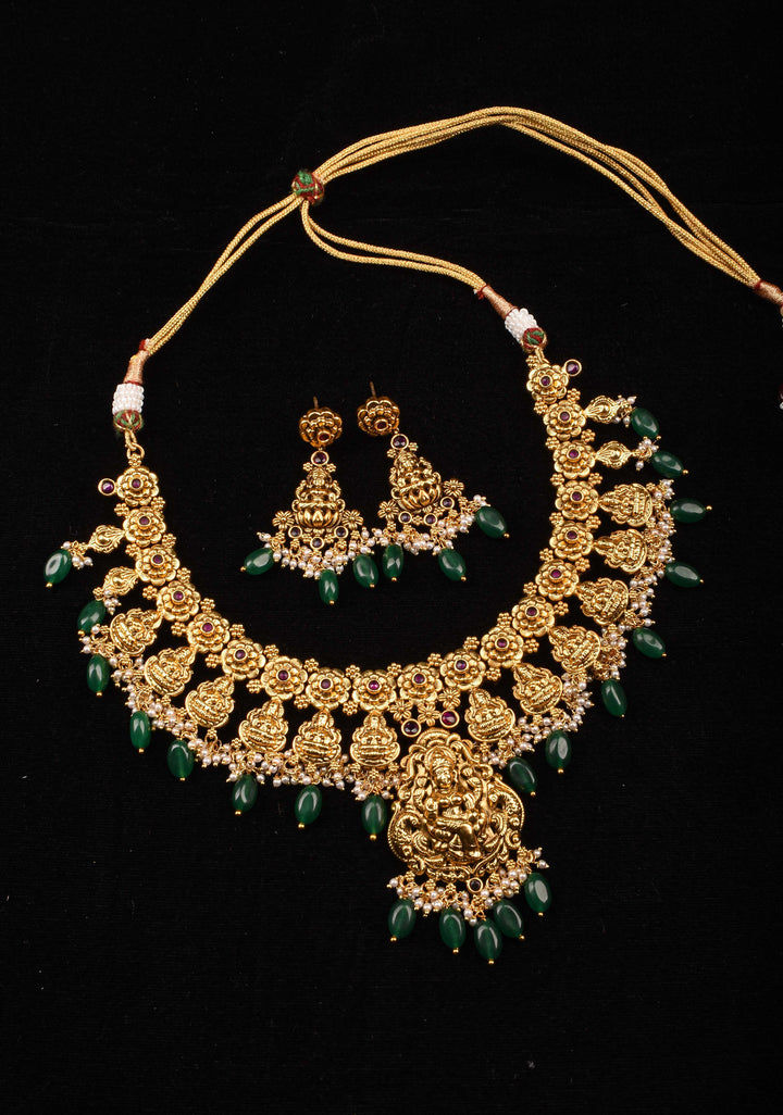 Jadau Lakshmi Necklace Set with Pink Stones dangling Green Beads | Shobitam Jewelry