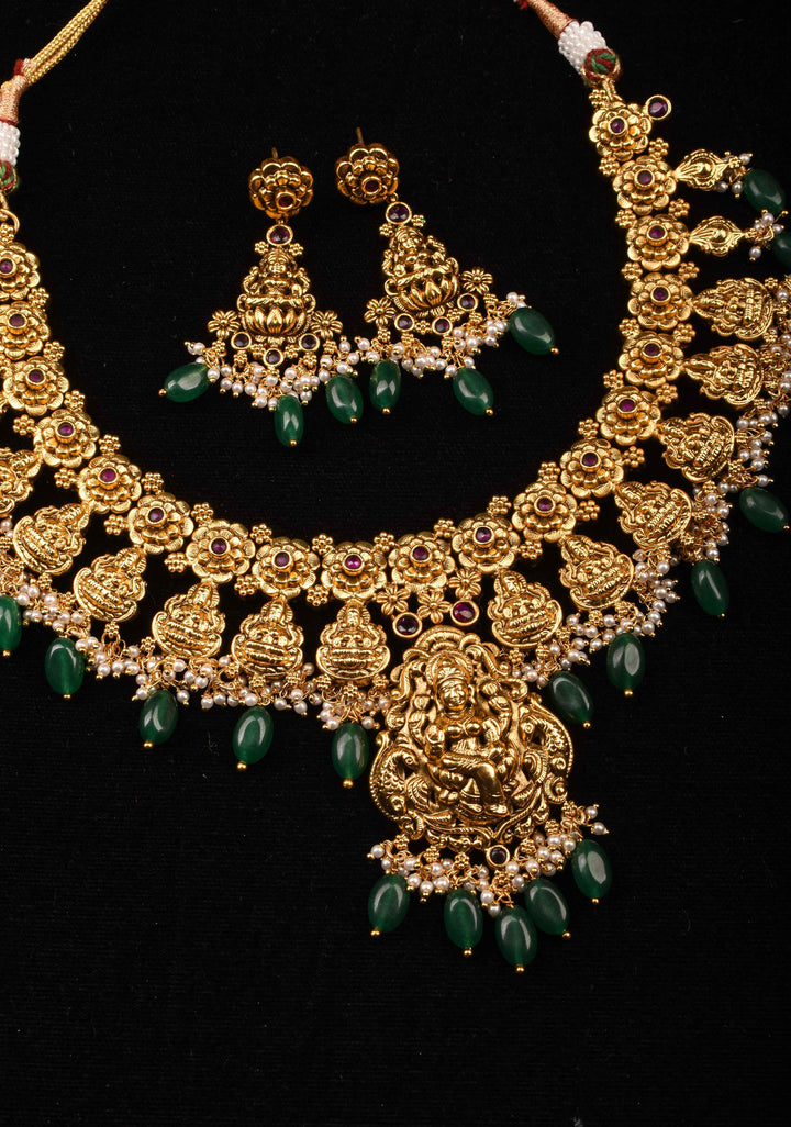 Jadau Lakshmi Necklace Set with Pink Stones dangling Green Beads | Shobitam Jewelry