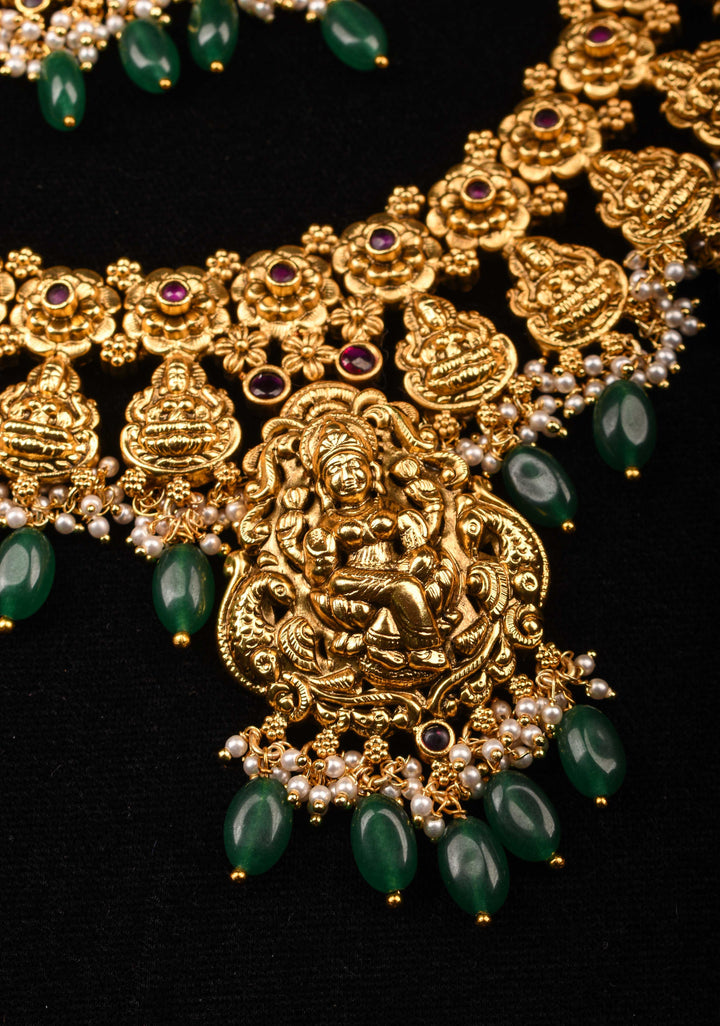 Jadau Lakshmi Necklace Set with Pink Stones dangling Green Beads | Shobitam Jewelry