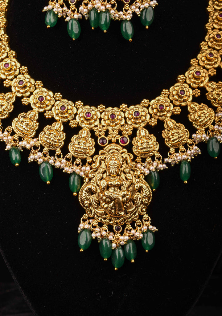 Jadau Lakshmi Necklace Set with Pink Stones dangling Green Beads | Shobitam Jewelry