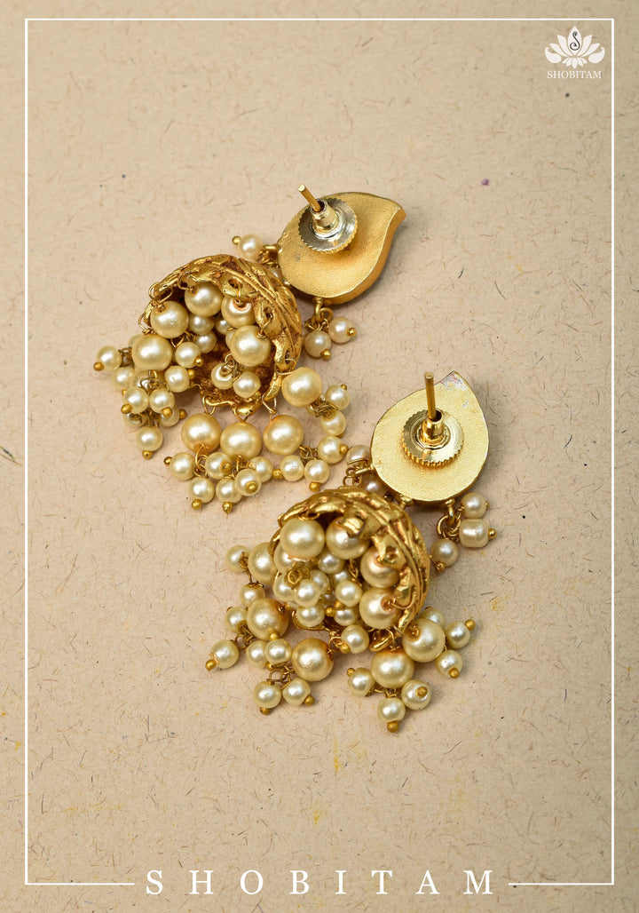 Gold tone Jhumka Earrings with Navaratna Polki Stones with Dangling Beads | Shobitam Jewelry
