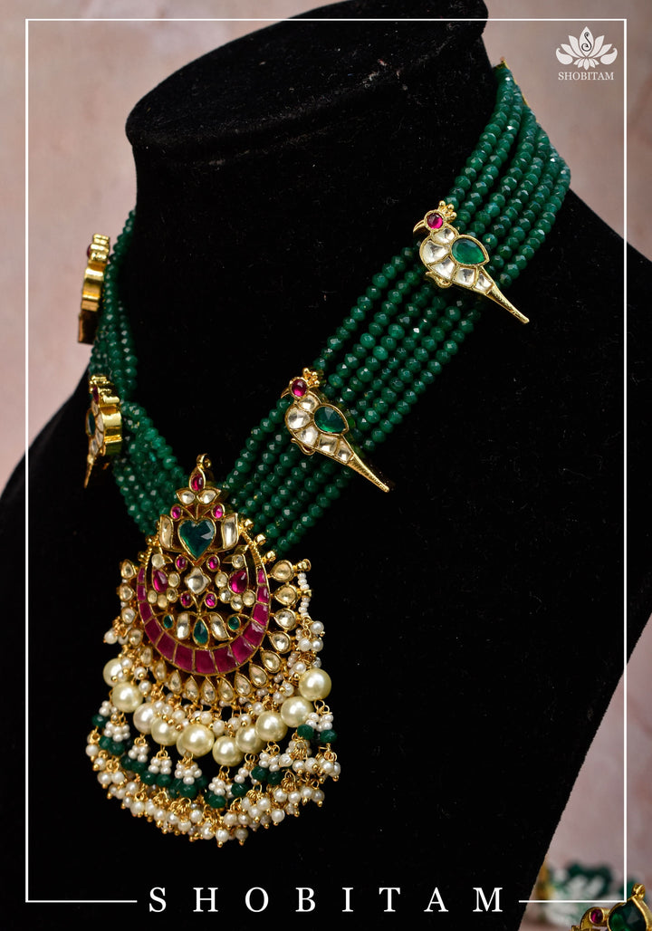 Ahmedabadi Green Stone  Multistrand necklace set with peacock units  | Shobitam Jewelry