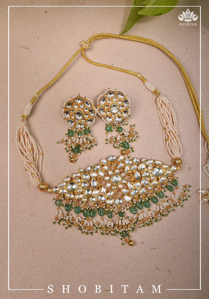 Ahmedabadi kundan multistrand necklace set with dangling pearl clusters