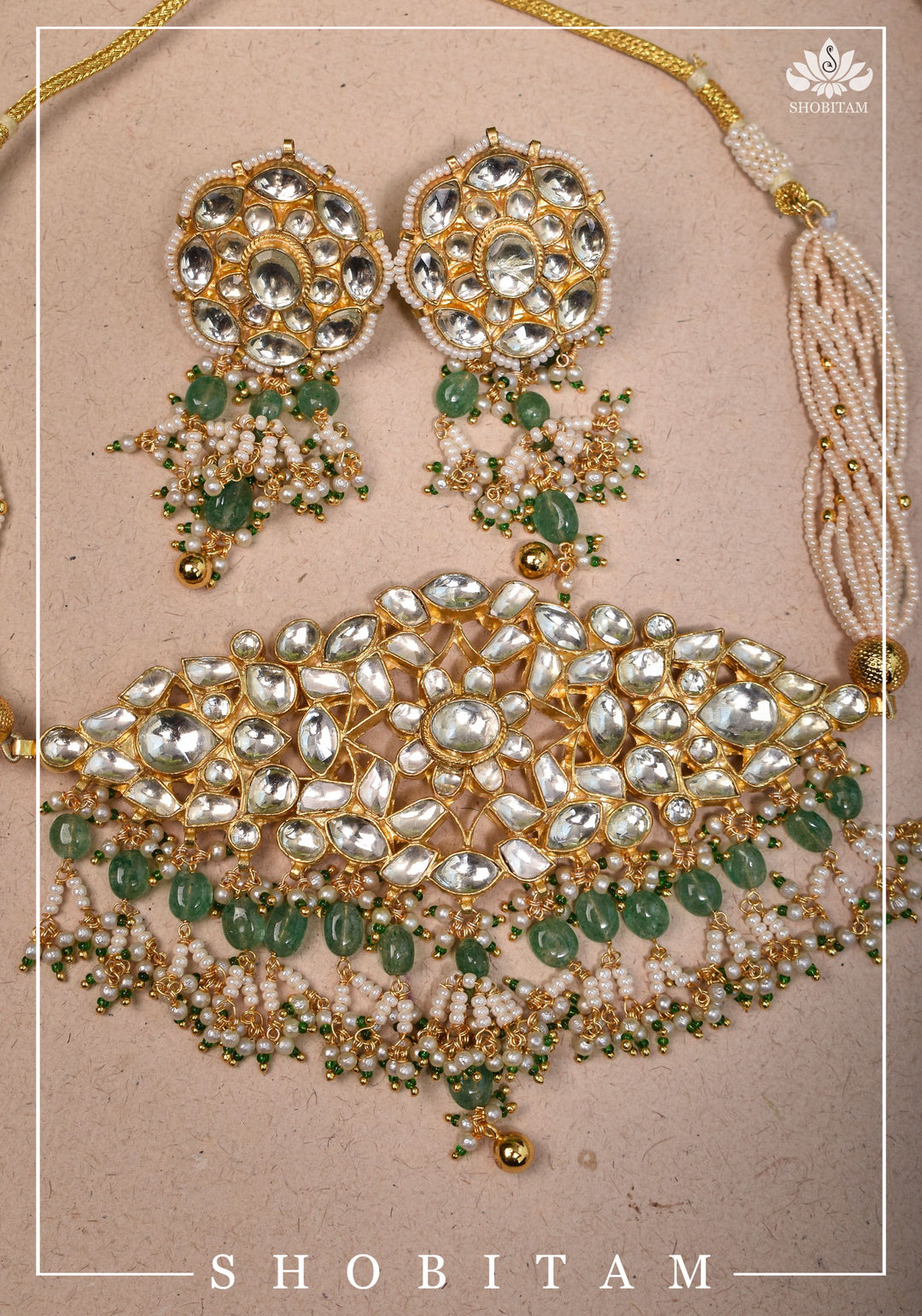 Ahmedabadi kundan multistrand necklace set with dangling pearl clusters