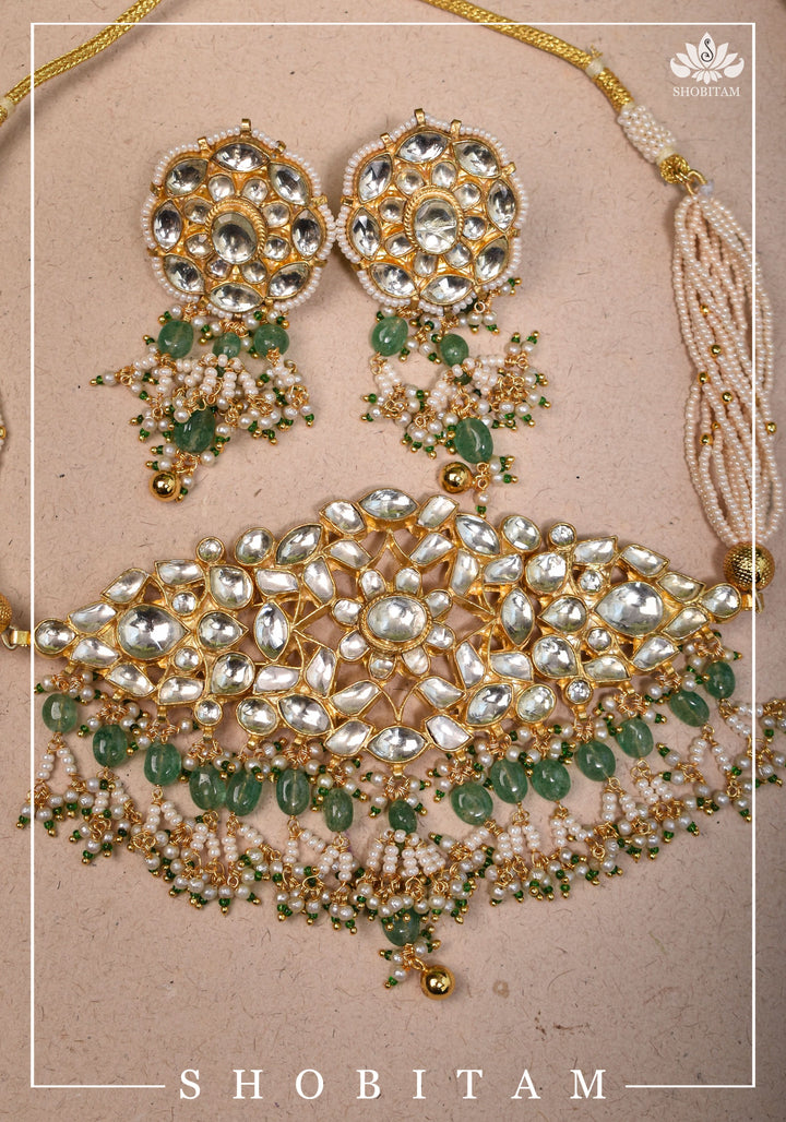 Ahmedabadi kundan multistrand necklace set with dangling pearl clusters
