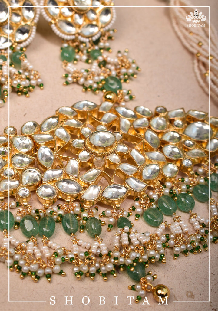 Ahmedabadi kundan multistrand necklace set with dangling pearl clusters