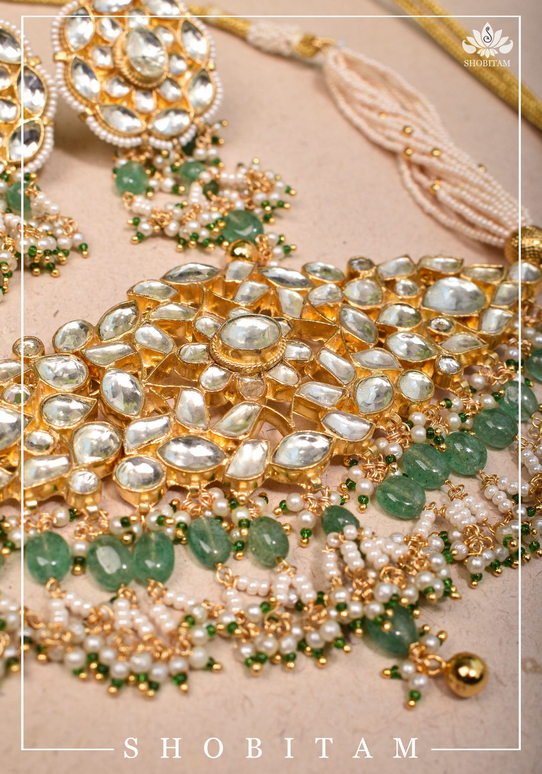 Ahmedabadi kundan multistrand necklace set with dangling pearl clusters