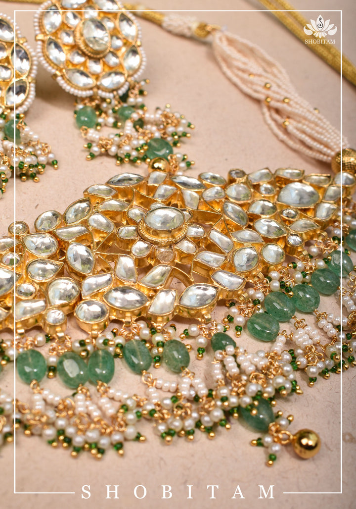 Ahmedabadi kundan multistrand necklace set with dangling pearl clusters