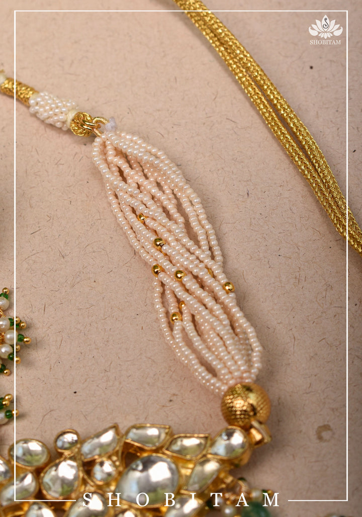 Ahmedabadi kundan multistrand necklace set with dangling pearl clusters