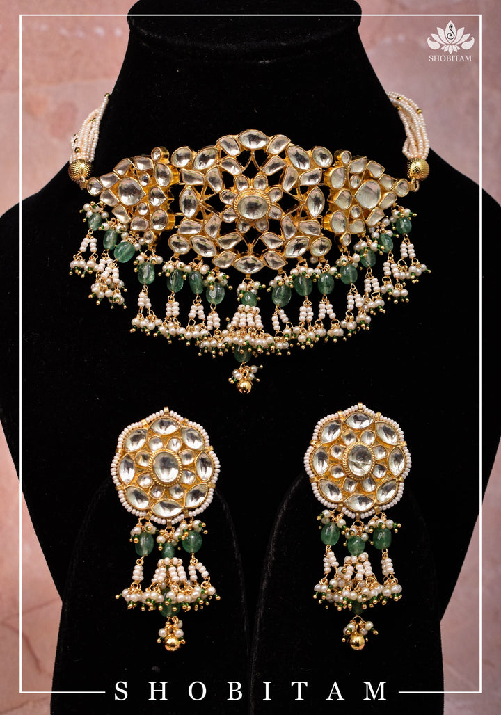 Ahmedabadi kundan multistrand necklace set with dangling pearl clusters