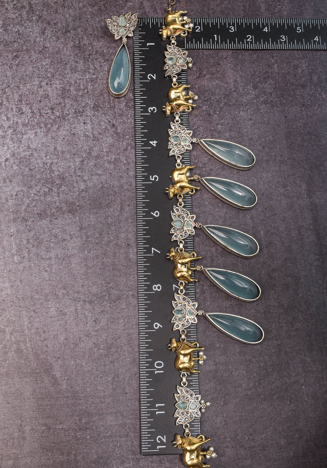 Fusion Dual Tone Jewelry with Pichwai Cow Units and Heather Blue Stones | Shobitam Jewelry