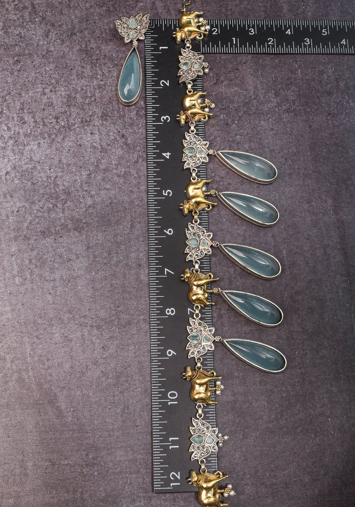 Fusion Dual Tone Jewelry with Pichwai Cow Units and Heather Blue Stones | Shobitam Jewelry
