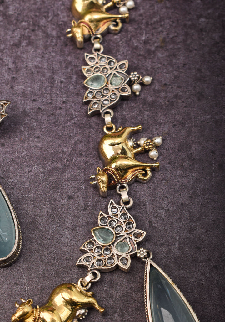 Fusion Dual Tone Jewelry with Pichwai Cow Units and Heather Blue Stones | Shobitam Jewelry