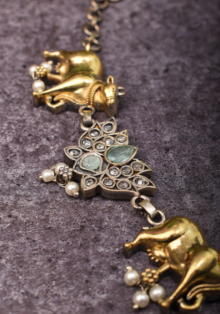 Fusion Dual Tone Jewelry with Pichwai Cow Units and Heather Blue Stones | Shobitam Jewelry