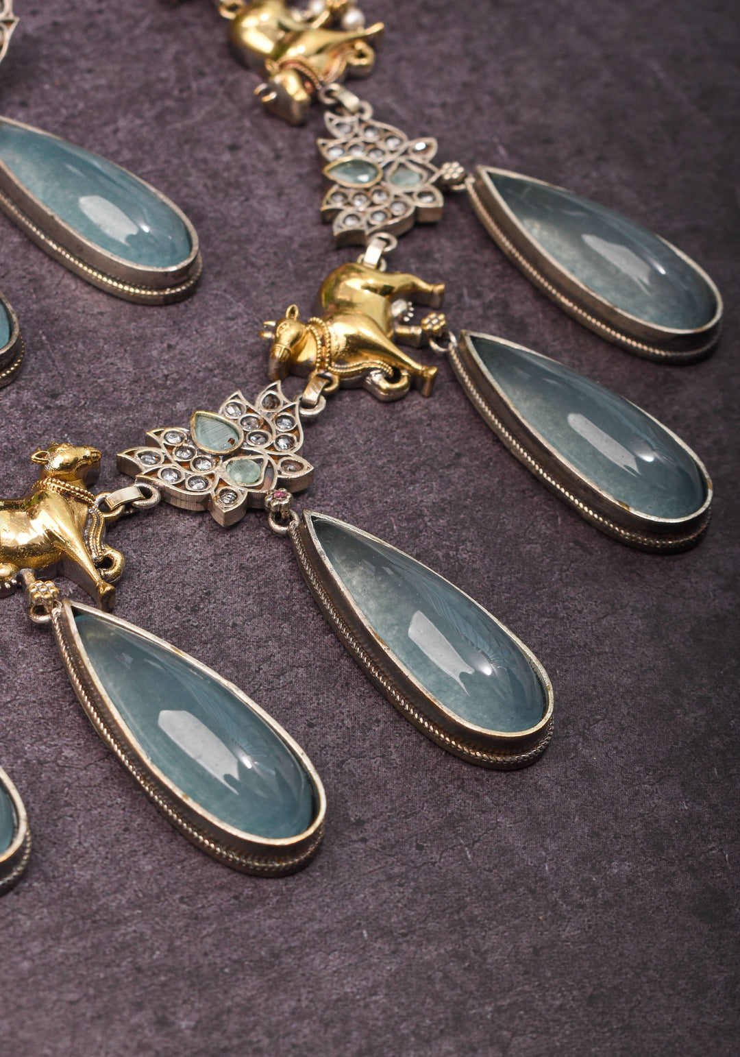 Fusion Dual Tone Jewelry with Pichwai Cow Units and Heather Blue Stones | Shobitam Jewelry