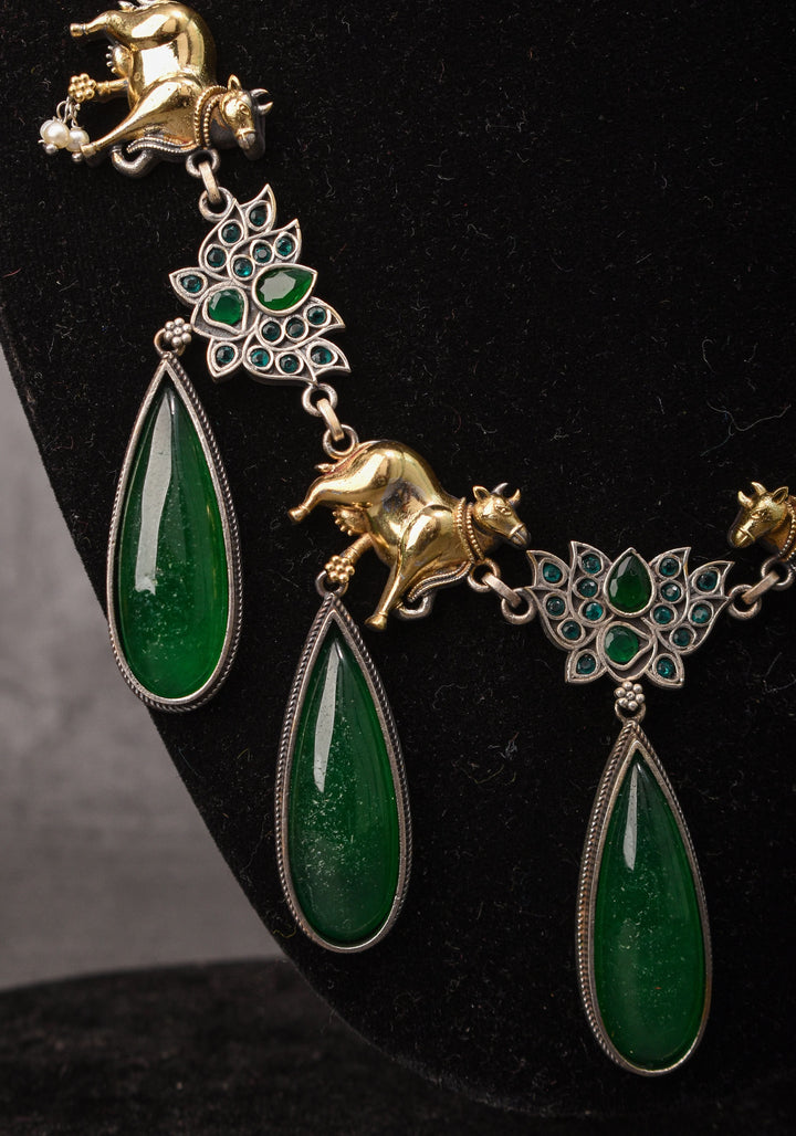 Fusion Dual Tone Jewelry with Pichwai Cow units and Green stones | Shobitam Jewelry