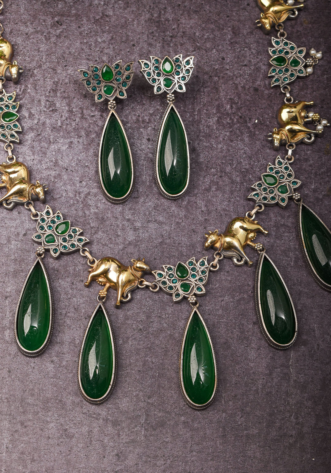 Fusion Dual Tone Jewelry with Pichwai Cow units and Green stones | Shobitam Jewelry