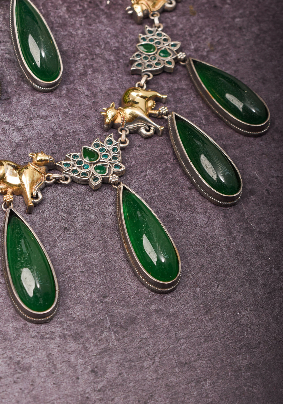 Fusion Dual Tone Jewelry with Pichwai Cow units and Green stones | Shobitam Jewelry