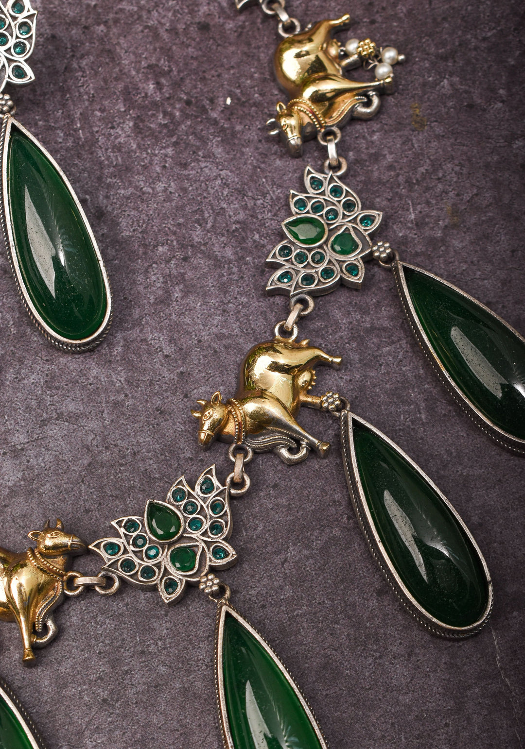 Fusion Dual Tone Jewelry with Pichwai Cow units and Green stones | Shobitam Jewelry