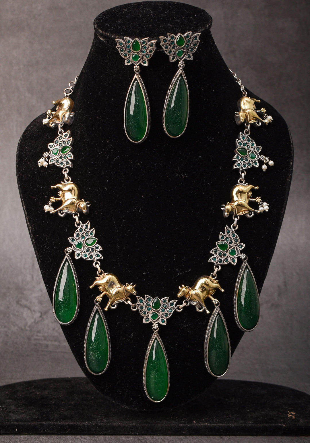 Fusion Dual Tone Jewelry with Pichwai Cow units and Green stones | Shobitam Jewelry