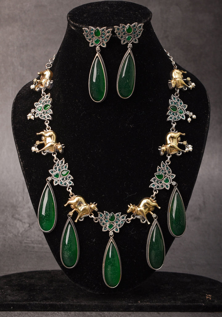 Fusion Dual Tone Jewelry with Pichwai Cow units and Green stones | Shobitam Jewelry