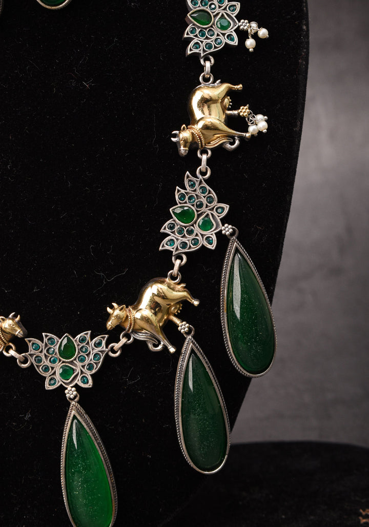 Fusion Dual Tone Jewelry with Pichwai Cow units and Green stones | Shobitam Jewelry