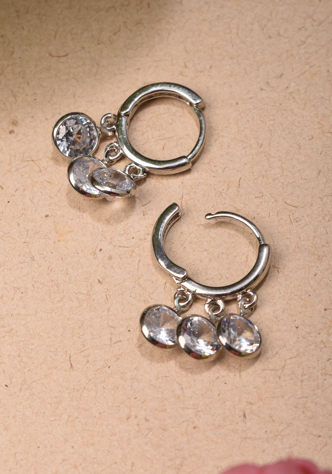 Silver Hoop Huggies Earrings with Dangling Clear Stones | Shobitam Jewelry
