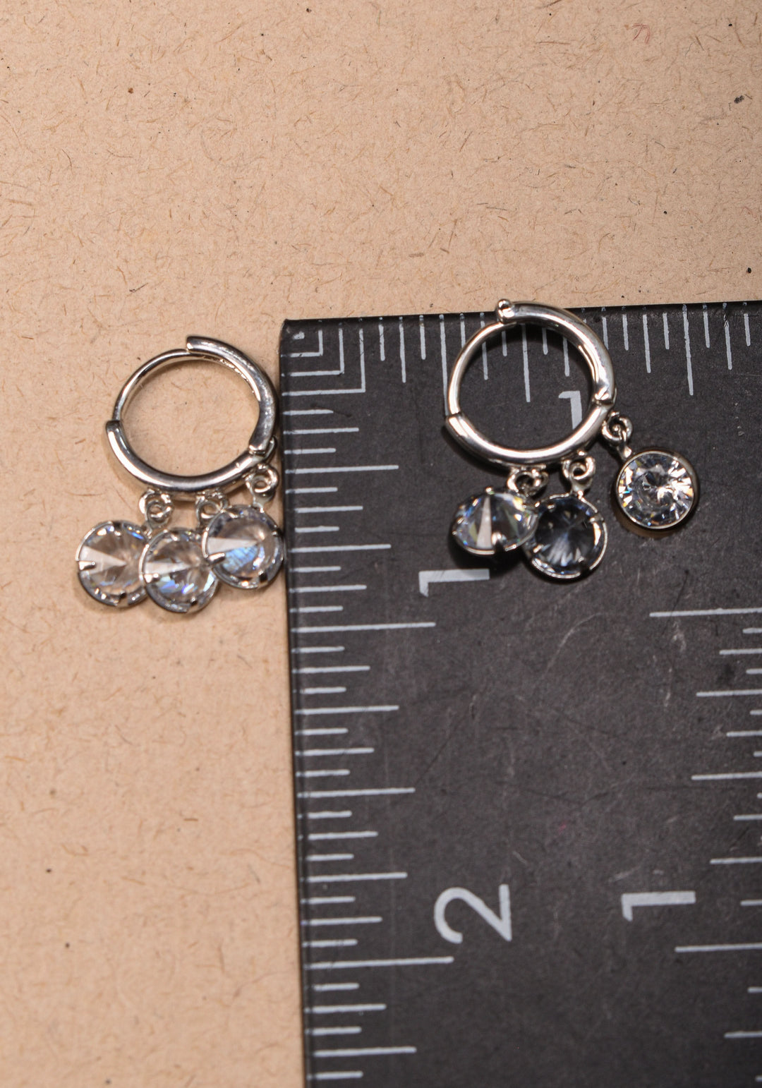 Silver Hoop Huggies Earrings with Dangling Clear Stones | Shobitam Jewelry