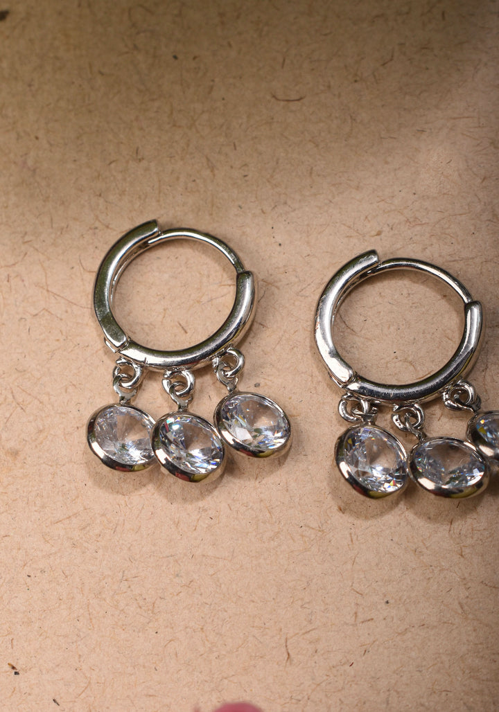 Silver Hoop Huggies Earrings with Dangling Clear Stones | Shobitam Jewelry